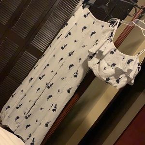 Two piece Palazzo front slits stripped pants with matching top.